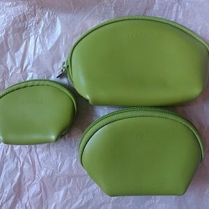 Three green nesting Furla leather pouches